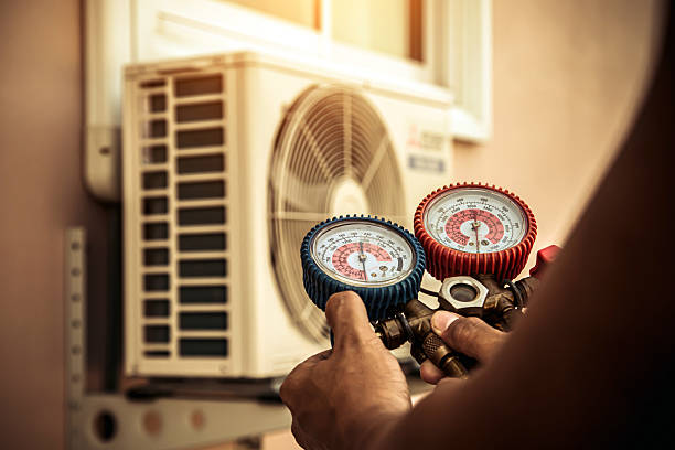 Professional Air Conditioning Service technician working in Murrieta, CA